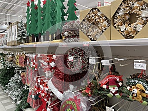 Christmas decorations for sale in a shop.