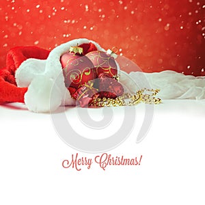 Christmas decorations on Santa hat with white copy space