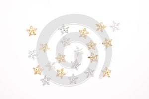 Christmas decorations, silver snowflakes and gold snowflakes on