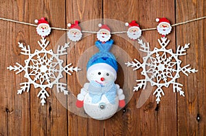 Christmas decorations: snowman and snowflakes with clothes pins