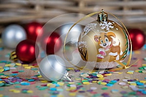 Christmas decorations on table with confetti