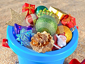 Christmas decorations and toys on the beach