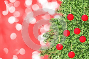 Christmas decorations tree on Red de-focused lights background, Happy New Year and Xmas