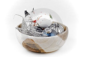 Christmas decorations in a wooden bowl