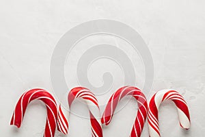 Christmas decors with gray background. Candy cane. Top view with copy space