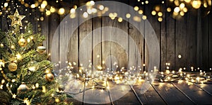 Christmas - Defocused String Light On Rustic Wooden Table