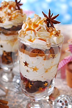 Christmas dessert with gingerbread,whipped cream and caramel