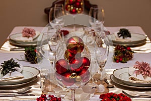 Christmas dining table with decorative ornaments for Christmas day lunch. photo