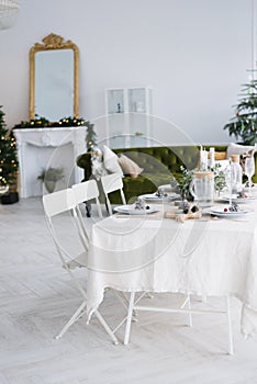 Christmas dining table with two chairs in the living room