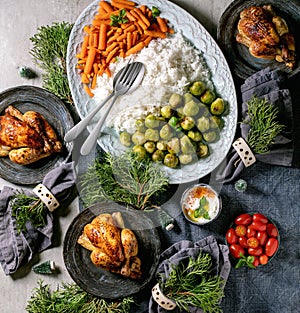 Christmas dinner table with grilled chicken, rice and vegetables