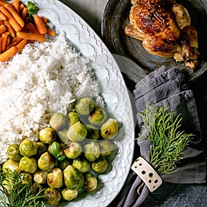 Christmas dinner table with grilled chicken, rice and vegetables