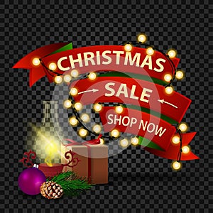 Christmas discount banner in the form of red ribbon with garland, gift, antique lamp, Christmas tree branch, cone, Christmas ball