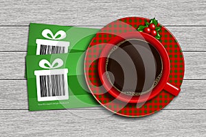 christmas discount coupons with barcode and coffee on wooden desk