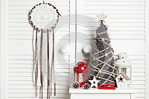 Christmas dream catcher on door background