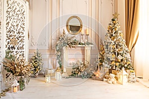 Christmas Elegant interior, beige and gold, decorative stucco. photo
