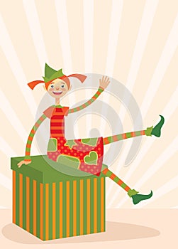 Christmas elf sitting on a gift box