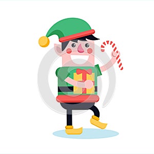 Christmas elf walking and smiling with sweet candy stick. Cute c