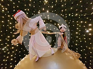 Christmas elfs on a christmas ball