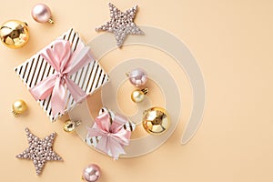 Christmas Eve concept. Top view photo of stylish present boxes with pink ribbon bows sparkle star ornaments gold and pink baubles