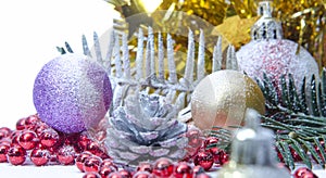 Christmas evergreen spruce tree, glass ball and snow