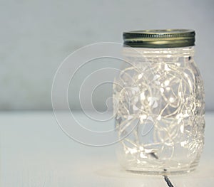 Christmas fairy lights in a mason jar