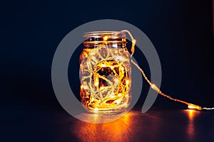 Christmas fairy lights in a mason jar