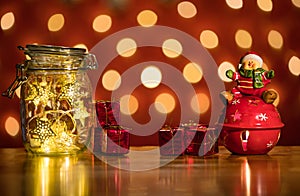 Christmas fairy lights in a mason jar, glowing in the dark, fair