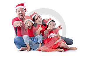 Christmas family asian pointing to camera