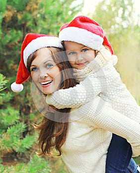 Christmas, family concept - happy mother and child having fun together