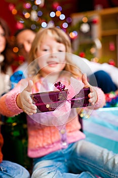 Christmas - family with gifts on Xmas Eve