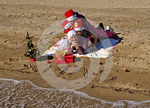 Christmas family at sand beach