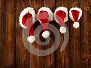 Christmas Family Santa Claus Hats Hanging on Wood Wall, Xmas Hat