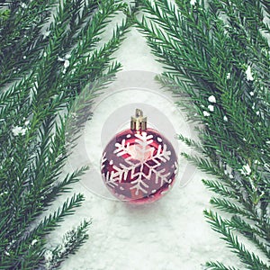 Christmas festival concepts ideas with ornament ball on snow