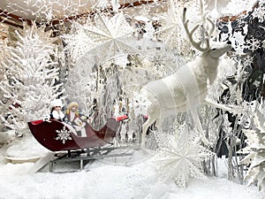 Christmas festive street decorations, holiday winter shopping. Christmas decorations in shopping mall window