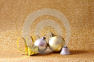 christmas festive tree ball decoration on glitter background.