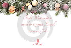 Christmas fir branches against white background with the text Merry Christmas and a Happy New Year