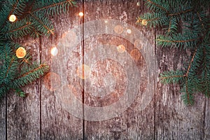 Christmas Fir branches on wooden background. Xmas and Happy New Year composition. Flat lay,