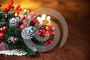 Christmas fir with pinecone and garland