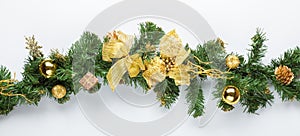 Christmas fir tree branch with golden decoration