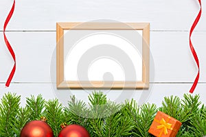 Christmas fir tree with decoration. Photo frame copy space