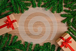 Christmas fir tree with decoration on wooden board