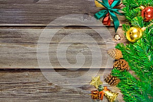 Christmas fir tree, festive. Composition decorations, xmas gift boxes on dark wooden board background. Celebration for holiday con