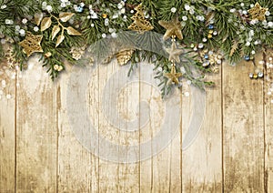 Christmas fir tree with vintage decoration on wooden board.