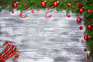 Christmas fir tree on wooden background