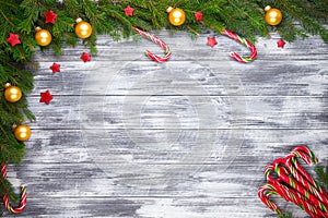 Christmas fir tree on wooden background