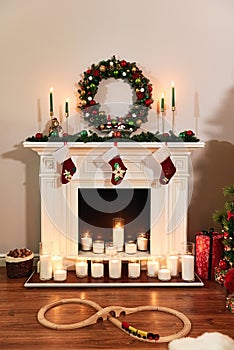 Christmas fireplace with Santa socks. Christmas stocking hanging from a mantel or fireplace
