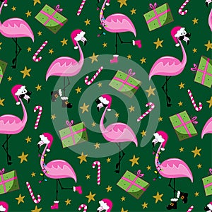 Christmas flamingo seamless pattern. Funny flamingos in Santa\'s hat. Gift box and candy cane.