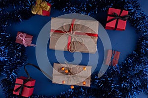 christmas flat lay on dark blue background with gifts