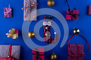 christmas flat lay on dark blue background with gifts