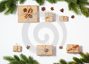 Christmas flat lay frame with copy space mockup. Present boxes and fir tree branches composition